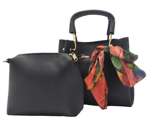 Black handbag set with a colorful scarf on a white background