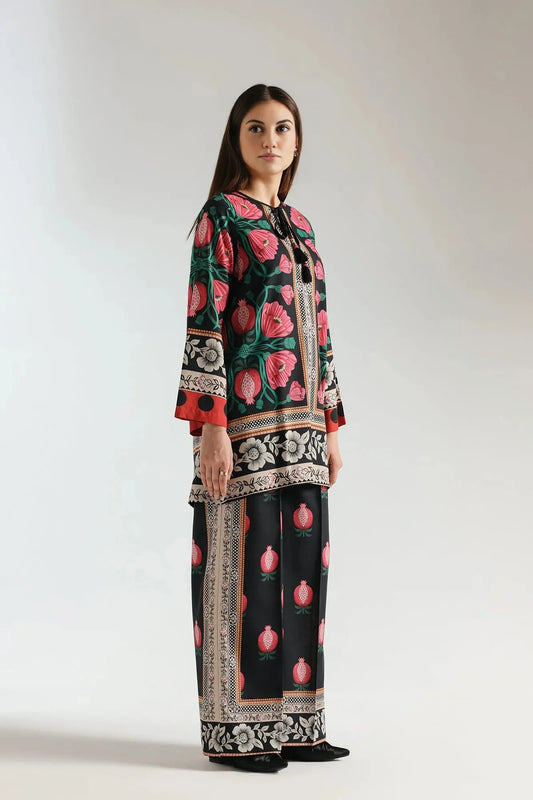 Woman wearing a floral dress with a black background