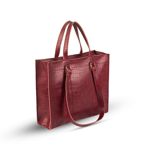 Maroon leather tote bag with a textured pattern on a white background