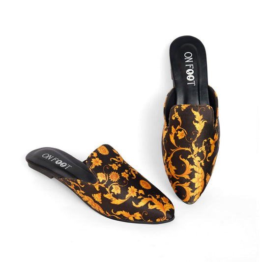 Pair of black and gold patterned mules with 'ON FOOT' branding on a white background
