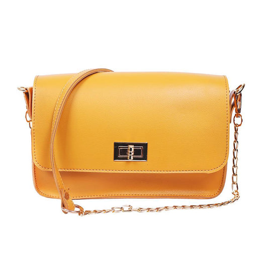 Yellow handbag with a chain strap on a white background