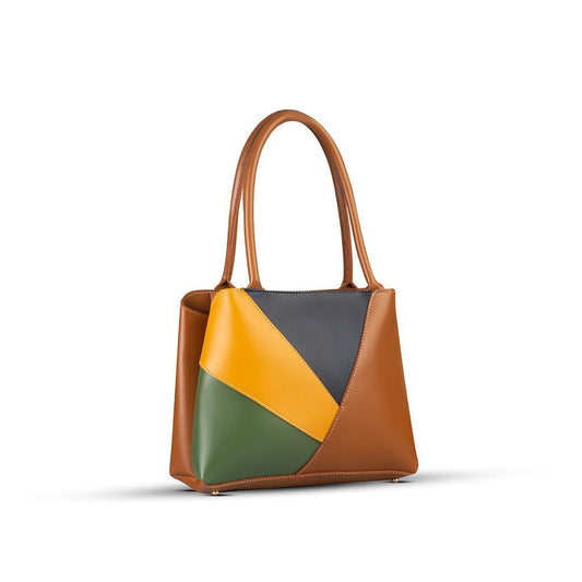 Multicolored handbag with brown, yellow, and green sections on a white background