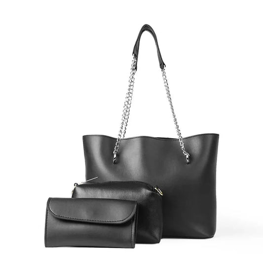 Set of black handbags with a chain detail on a white background