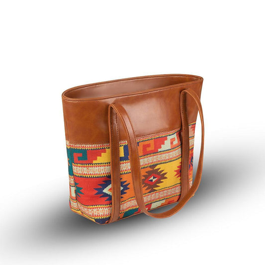 Brown tote bag with colorful patterned side on a white background