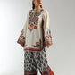 Woman wearing a traditional embroidered outfit with a white background