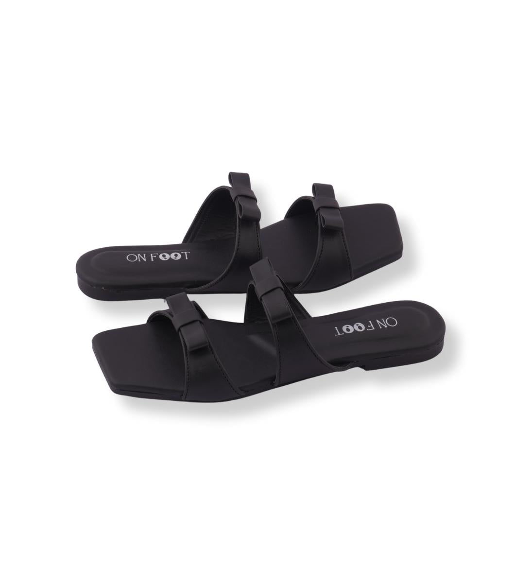 Black sandals with 'ON FOOT' branding on a white background