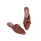 Brown leather mules with crochet details on a white background