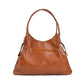 Brown leather handbag on a white background