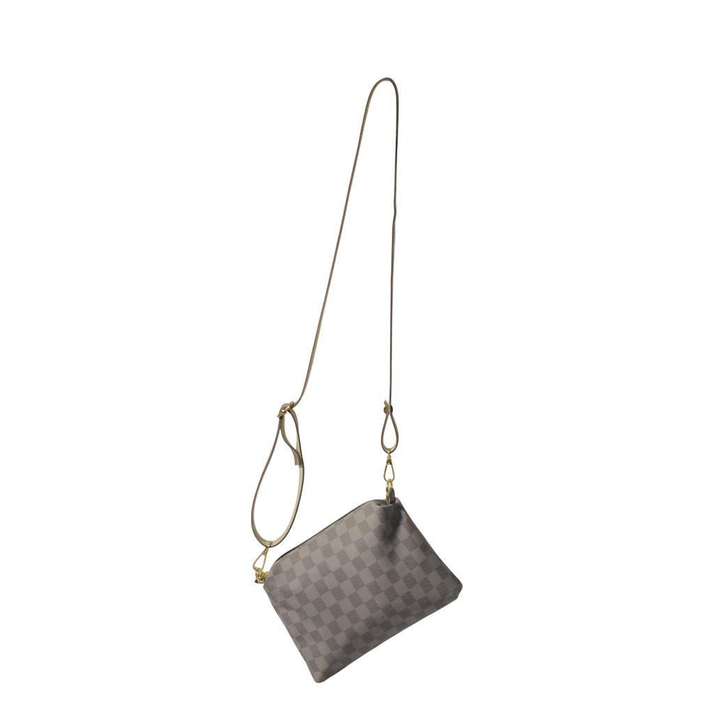 Gray crossbody bag with a long strap on a white background