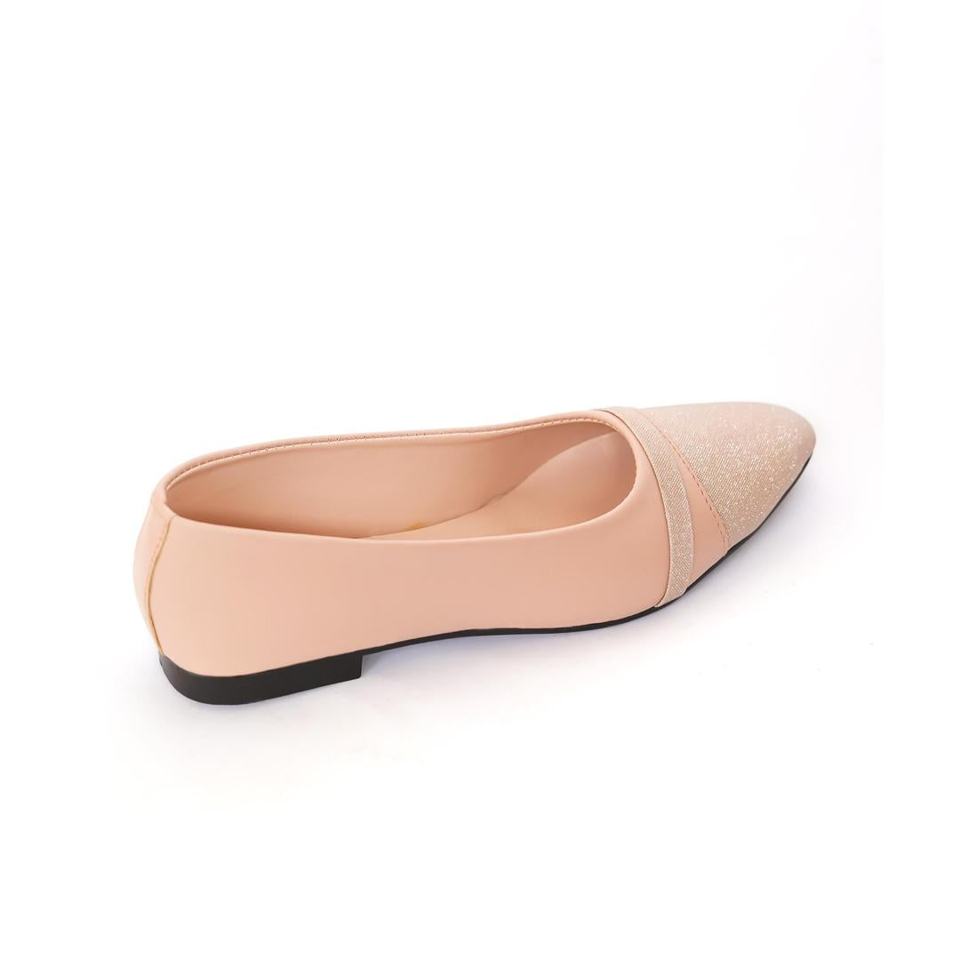 Beige flat shoe on a white background