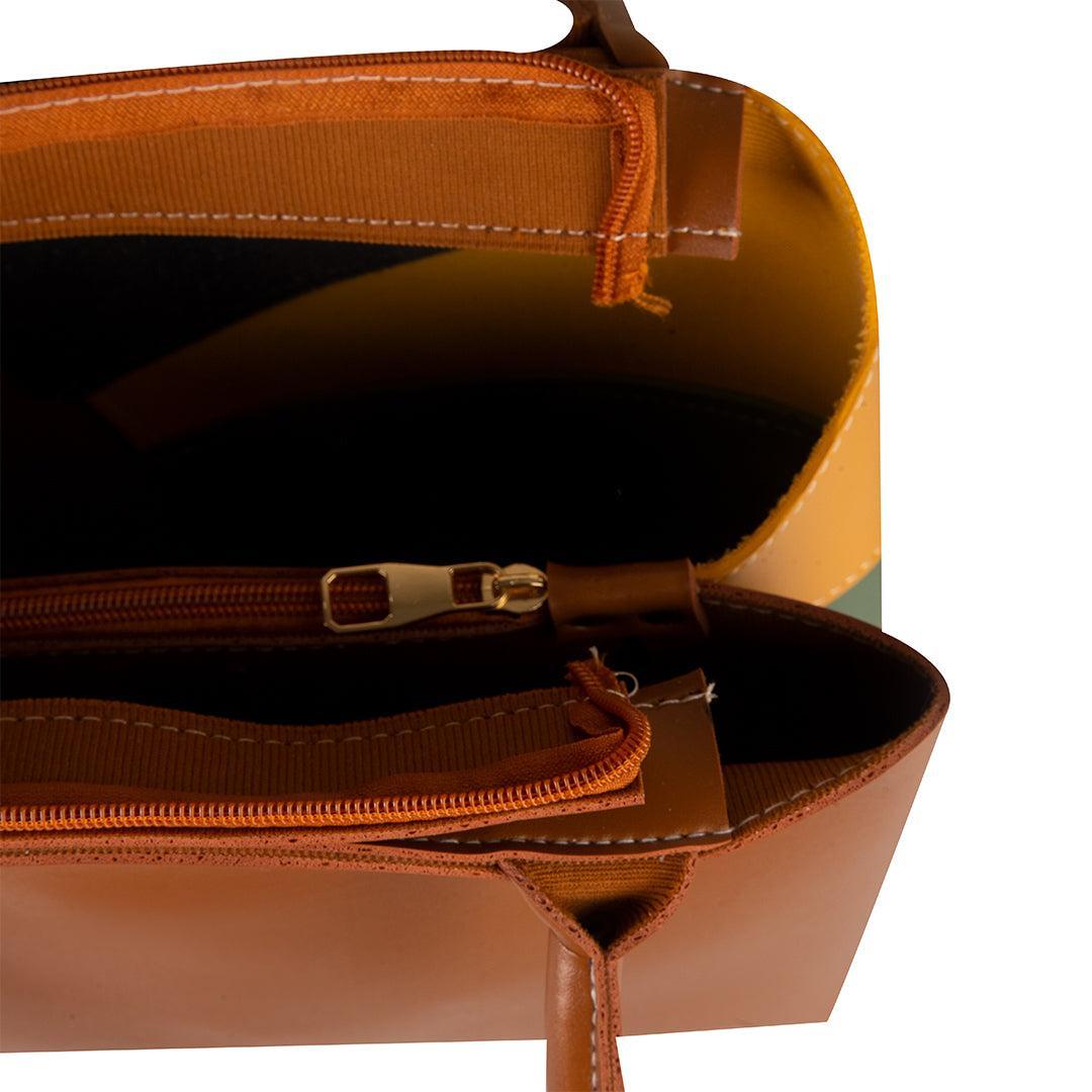 Brown leather bag with zippers on a white background