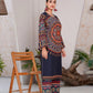 Woman wearing a colorful traditional outfit in a minimal indoor setting