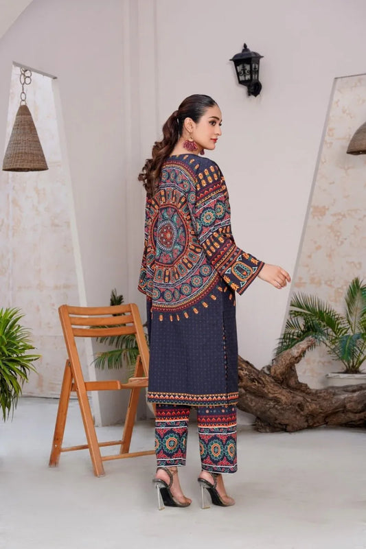 Woman wearing a colorful traditional outfit in a minimal indoor setting