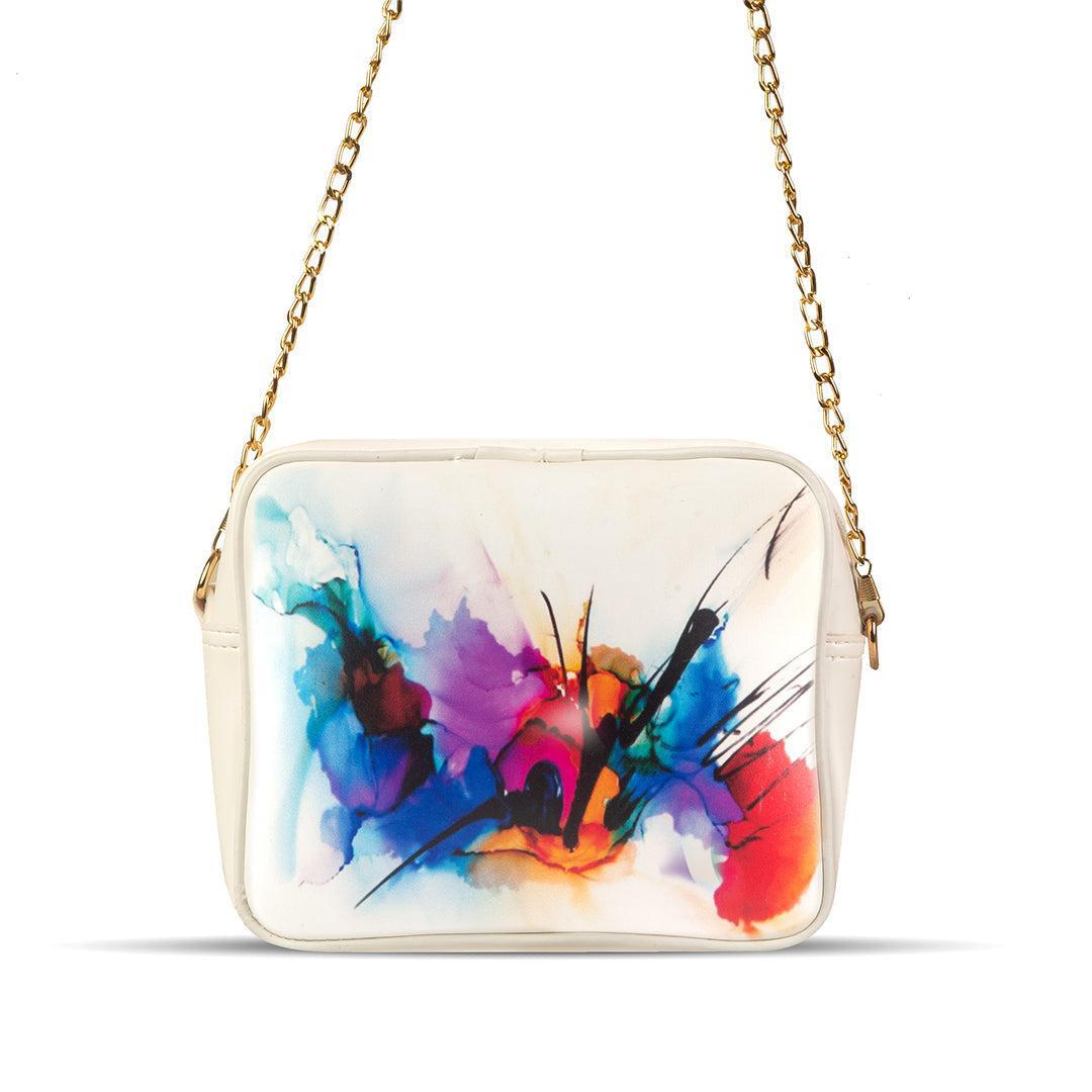 Colorful abstract design handbag with a gold chain on a white background
