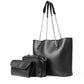 Black handbag with chain detail and matching pouch on a white background